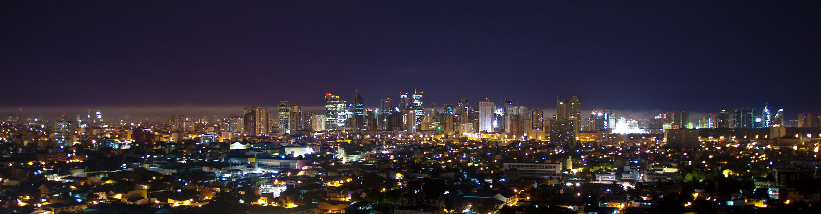 The modern Makati skyline of Metro Manila at night